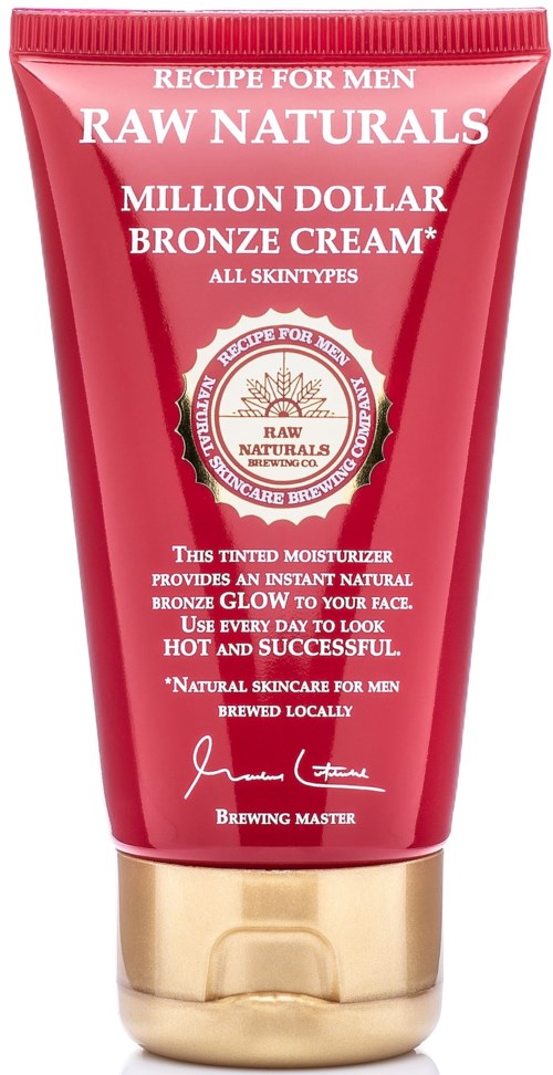 A red tube of men's moisturizer with gold cap, labeled 'Raw Naturals Million Dollar Bronze Cream,' designed for a natural glow.