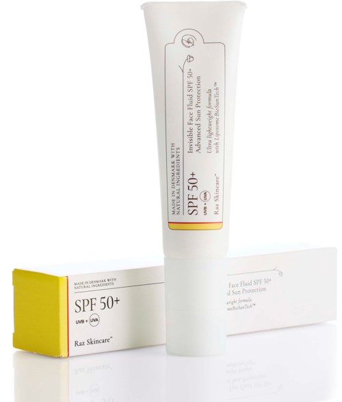 En vit solkrämstub med SPF 50+ och en gul och vit box, båda märkta för ansiktskydd.