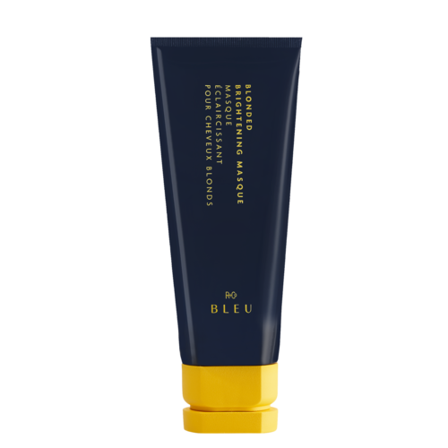 A dark blue tube of beard mask with yellow cap and text in gold color.