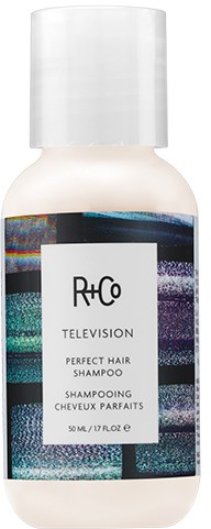 Valkoinen shampoopullo, jossa lukee R+Co, ja tarkoitettu täydellisiin hiuksiin.