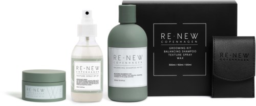 Hautpflege-Set mit grüner und schwarzer Verpackung, inklusive Spray, Dose, Flasche und Box.