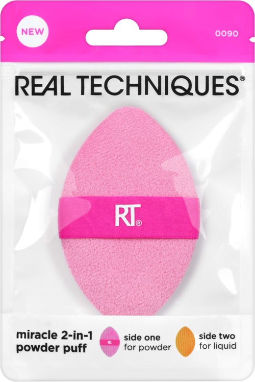 Pink beauty sponge labeled 'RT' in clear plastic packaging. It is used for makeup application.