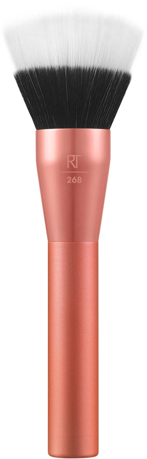 A makeup brush with a black and white fluffy top and a pink handle.