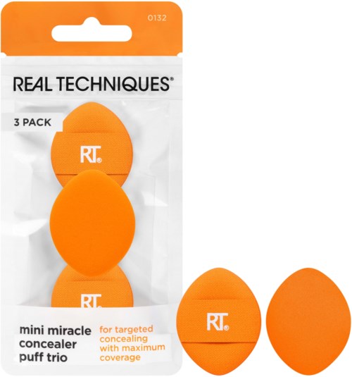 Three orange makeup sponges in packaging, labeled RT, used for applying concealer with full coverage.
