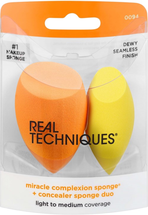 A package contains two makeup sponges, one orange and one yellow, labeled for different uses with text and branding.
