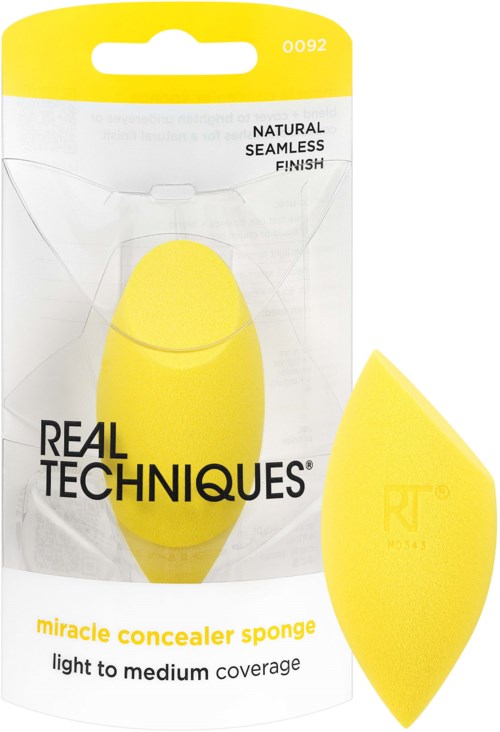 A yellow sponge with a rounded shape, packaged in clear plastic with brand and product information visible.