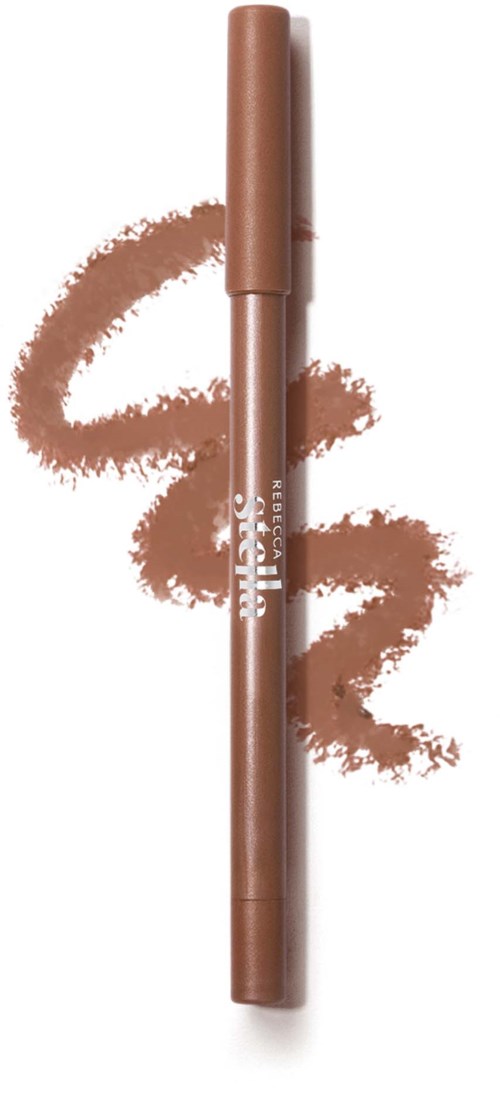 A brown lip liner pencil with a smudged line behind it.