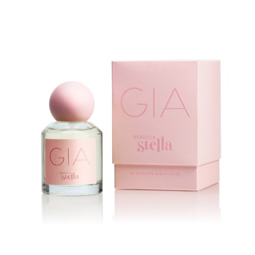 A perfume bottle with a pink label and round pink cap, next to a pink box with the words "GIA REBECCA Stella."