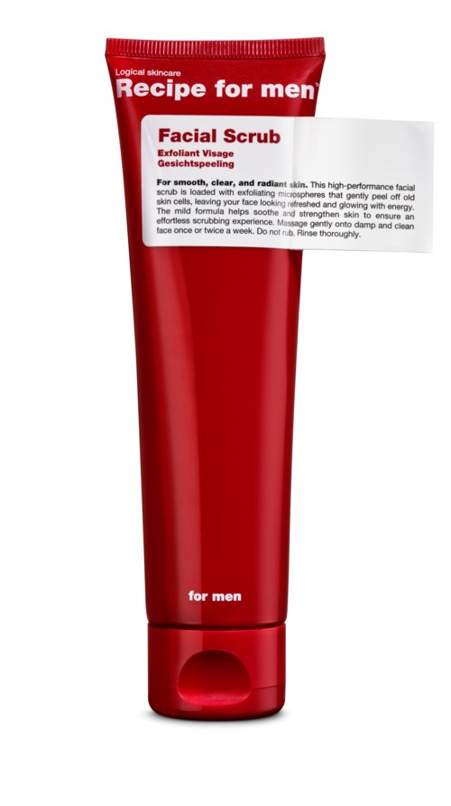 Rote Tube mit Aufschrift 'Facial Scrub for men' und weißem Etikett. Das Etikett hat rote und schwarze Schrift.