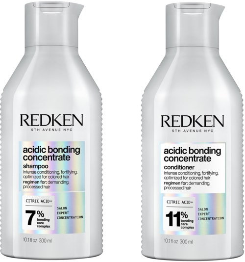 Redken shampoo and conditioner bottles with label details about acid bonding, citric acid, and hair care benefits.