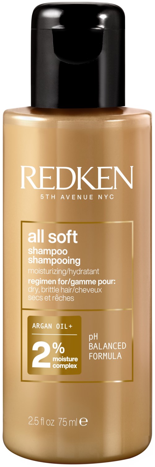 En beige schampoflaska med svart lock, märkt Redken All Soft, innehåller 2% arganolja, för mjukt och återfuktat hår.