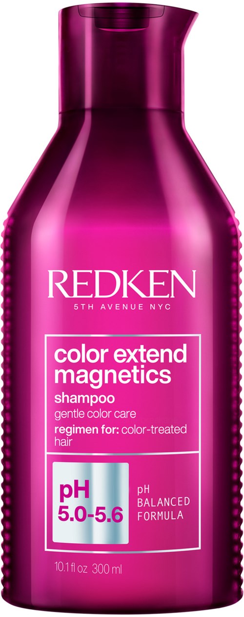 En magentafärgad flaska med Redken schampo för färgbehandlat hår med pH 5,0-5,6 balanserad.