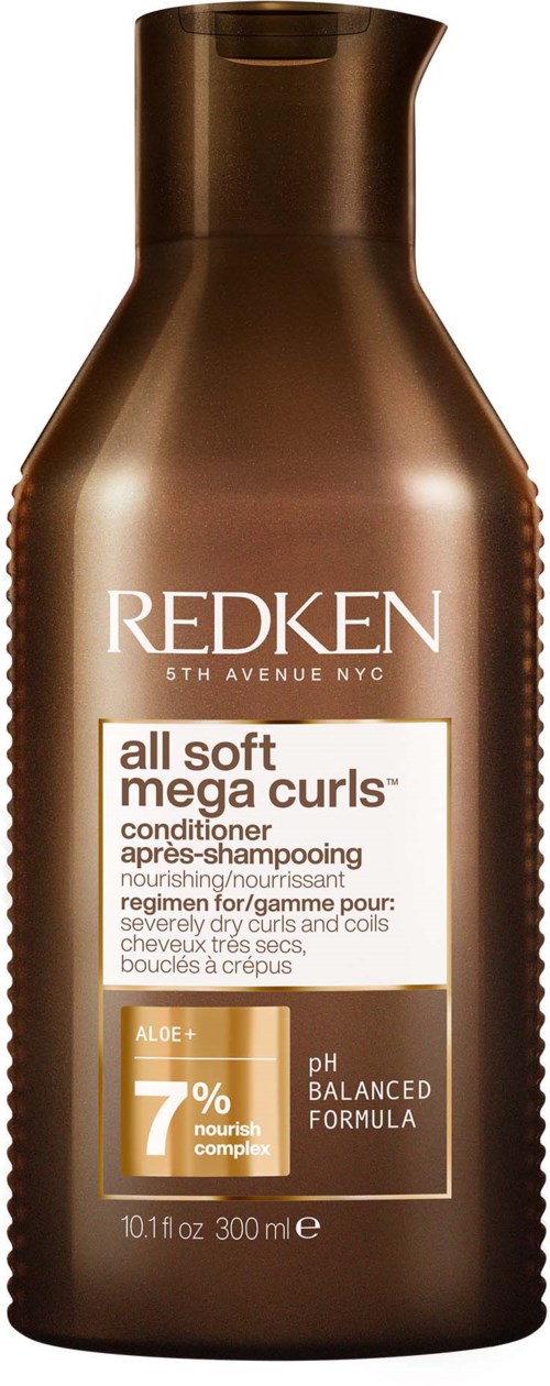 Brown bottle of Redken conditioner for soft, curly hair, with aloe, pH balanced formula, and 300ml size.
