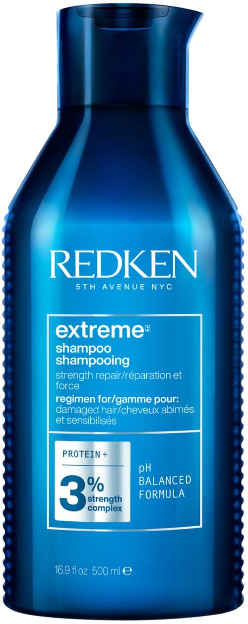 Blauwe shampoo fles met 'Redken Extreme' voor beschadigd haar, met eiwit en pH-balans formule, 16,9 fl oz.