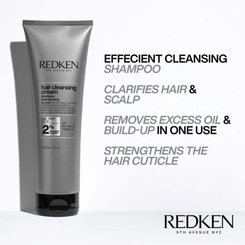 A shampoo tube beside text highlighting its benefits for hair cleansing, scalp clarity, and strengthening the hair cuticle.
