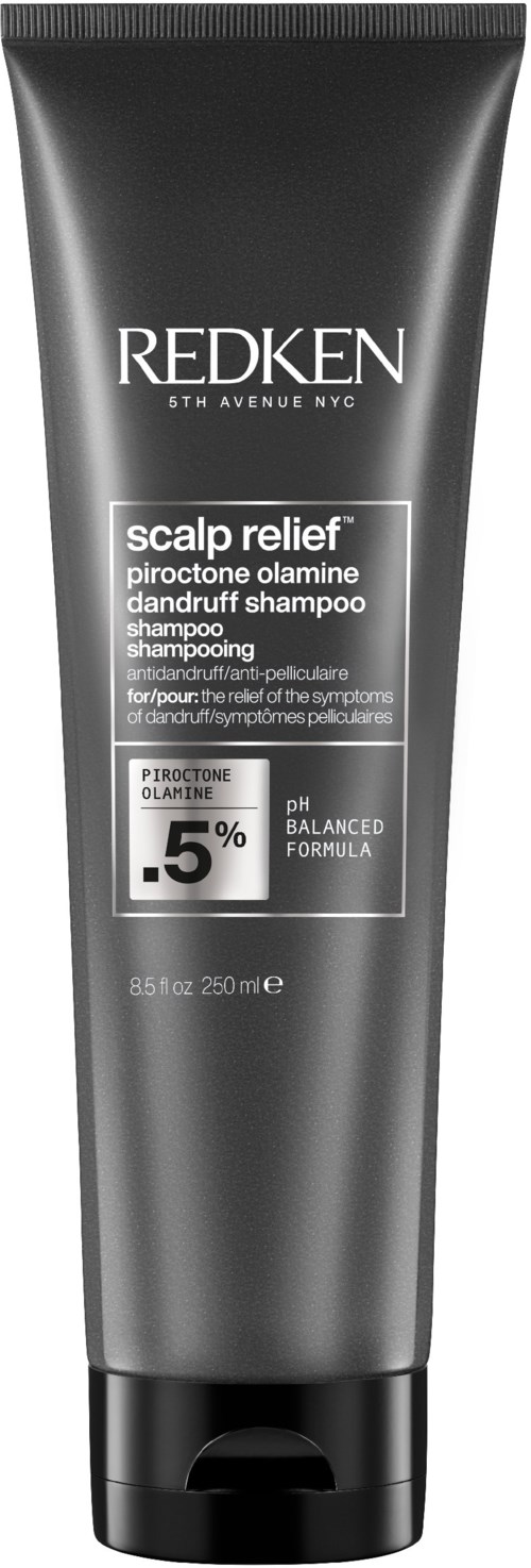 A black bottle of Redken scalp relief shampoo, containing 8.5 oz, for dandruff and scalp relief.