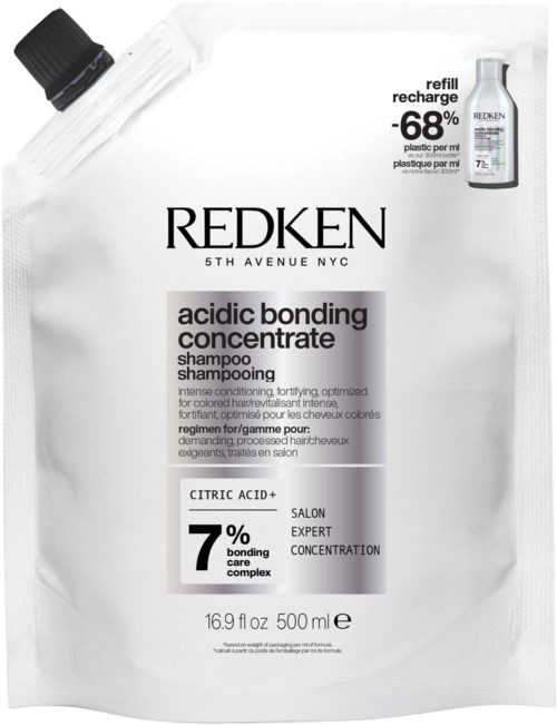 A white shampoo refill pouch with black and gray text, labeled 'Redken Acidic Bonding Concentrate' and notes 7% bonding care complex.
