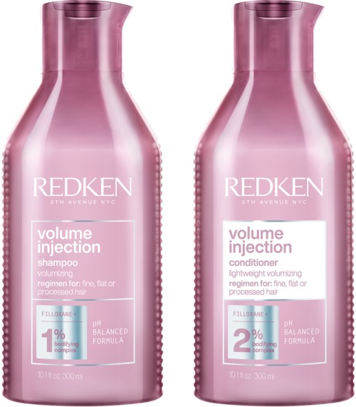 Two pink bottles, one shampoo and one conditioner, labeled 'Volume Injection' by Redken.