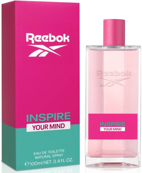 Roze doos en flesje van Reebok Inspire Your Mind parfum, met blauw en roze labels.