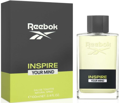 A Reebok Inspire Your Mind perfume box and bottle, with black, yellow, and white colors.