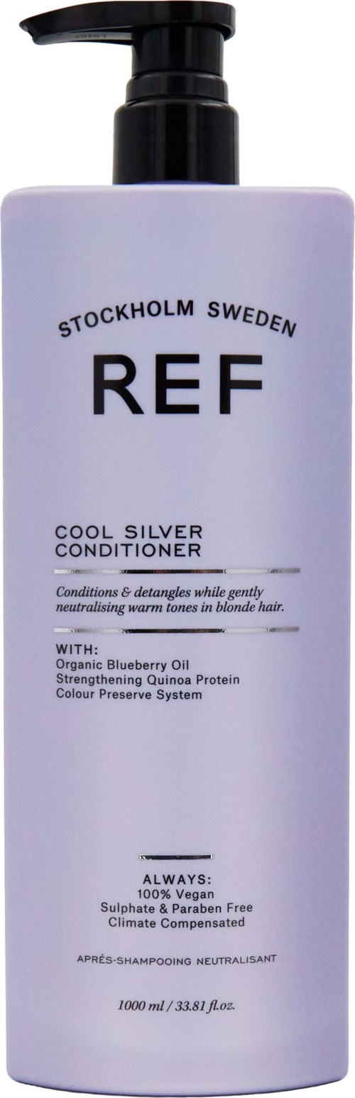 Eine weiße Flasche mit schwarzem Pumpkopf, beschriftet mit 'REF Stockholm Sweden' und 'Cool Silver Conditioner.'