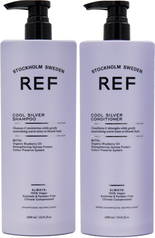 Two bottles labeled 'REF' for shampoo and conditioner from Stockholm, Sweden, with black pump tops and silver color.