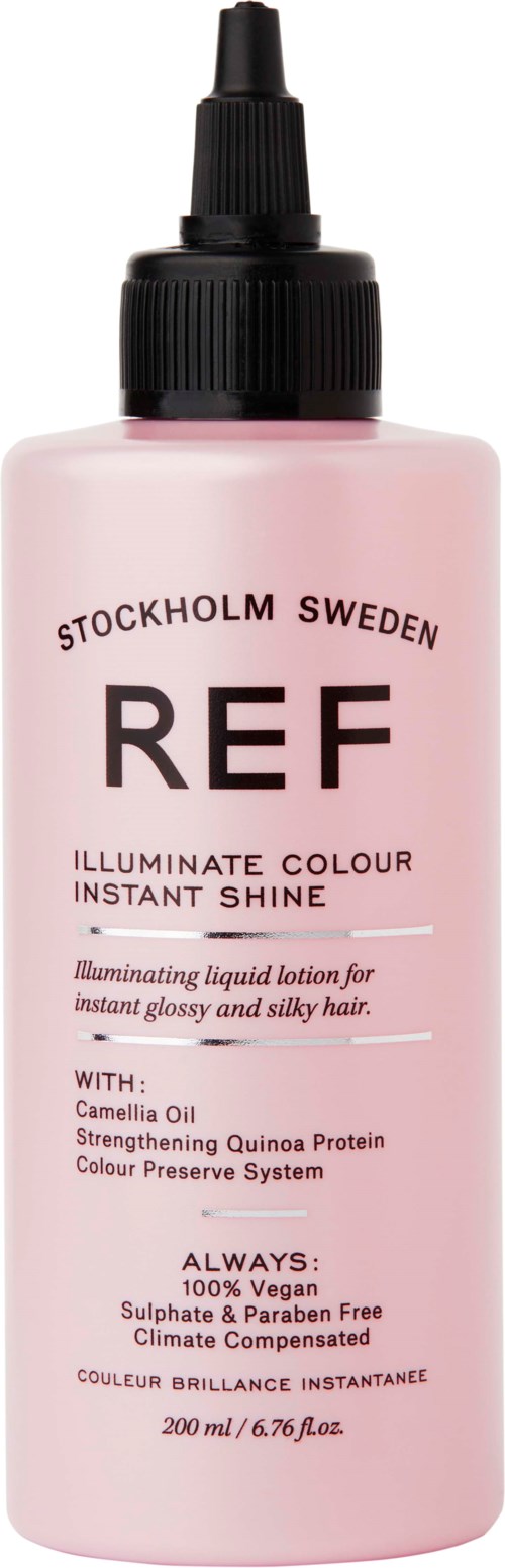 Ljusrosa flaska med svart lock, märkt 'REF Stockholm Sweden' för hårglans och färg. Innehåller veganska ingredienser.