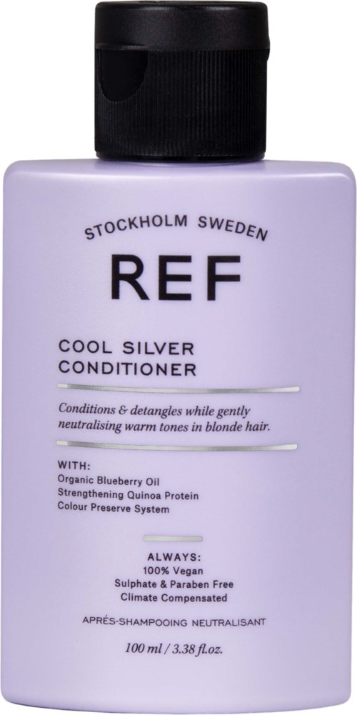 A white bottle of REF hair conditioner with black cap, labeled as cool silver, from Stockholm, Sweden.