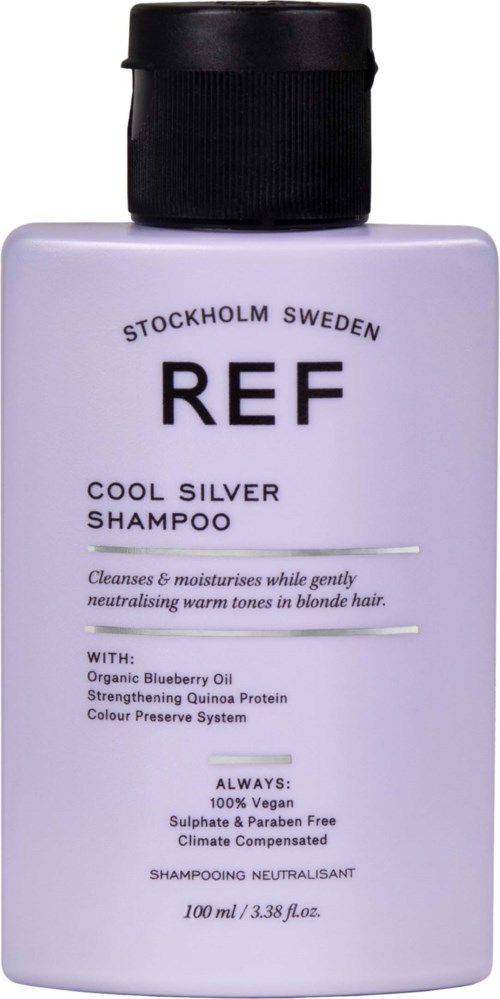 Weiße Shampoo-Flasche mit schwarzem Verschluss, gekennzeichnet 'REF Cool Silver Shampoo' aus Stockholm, Schweden, mit Produktdetails und Inhaltsstoffen.