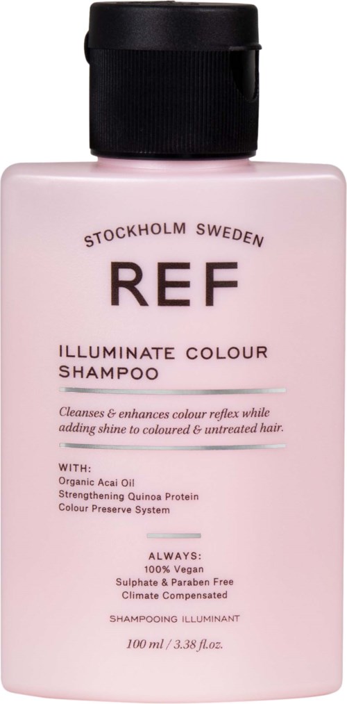 Eine hellrosa Shampoo-Flasche mit schwarzem Deckel, beschriftet mit REF, aus Stockholm Schweden, für Haarkunst und Glanz.
