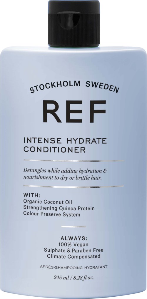 Eine weiße Flasche mit schwarzem Deckel, gekennzeichnet 'REF' für intensiven Hydratationsconditioner, mit Kokosöl und Quinoa.