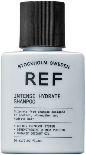 Vit schampoburk med svart lock, märkt 'REF' och 'Intense Hydrate Shampoo'. Den nämner att den stärker och återfuktar håret.