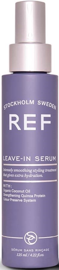 Eine lilafarbene Flasche mit Leave-in-Serum mit weißem Text, gekennzeichnet 'REF', aus Stockholm, Schweden, mit natürlichen Inhaltsstoffen.
