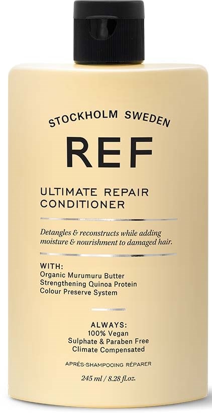Beige Flasche mit schwarzem Deckel, beschriftet 'REF Ultimate Repair Conditioner' aus Stockholm, Schweden, mit natürlichen Zutaten gegen geschädigtes Haar.