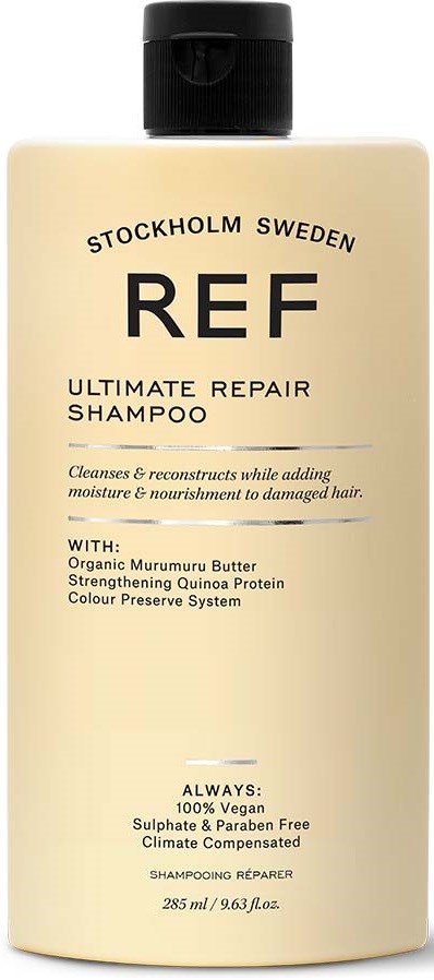 Eine beige Shampooflasche mit schwarzem Verschluss, gekennzeichnet REF Ultimate Repair Shampoo, aus Stockholm, Schweden, mit Schlüsselzutaten.