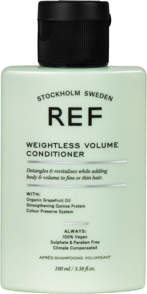 A light green bottle of REFERENCE weightless volume conditioner with black cap, containing ingredients like grapefruit oil and quinoa.