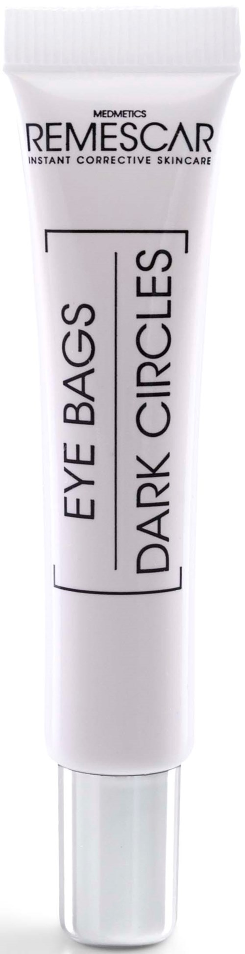 Een witte tube met 'Remescar' voor donkere kringen en wallen onder de ogen.