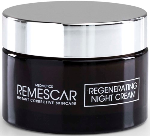 Een zwarte pot met zilveren deksel bevat Regenerating Night Cream voor huidverzorging.