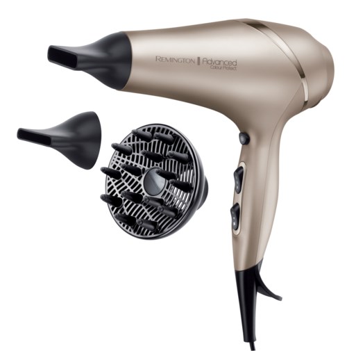 A beige hair dryer with two nozzles and a heat button. It has a black handle and is from Remington.