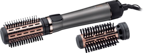 A curling iron with two attached rollers, used for curling hair. The device has a handle and electric cord.