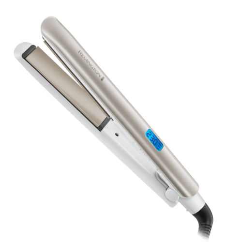 A flat iron hair straightener with digital temperature display. It is silver and black, used for styling hair.