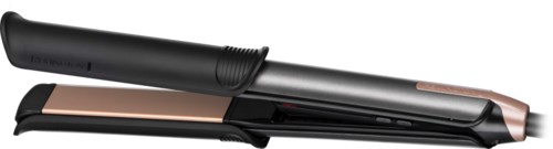 A flat iron hair straightener in black and silver colors, with a closed design and a heating plate.