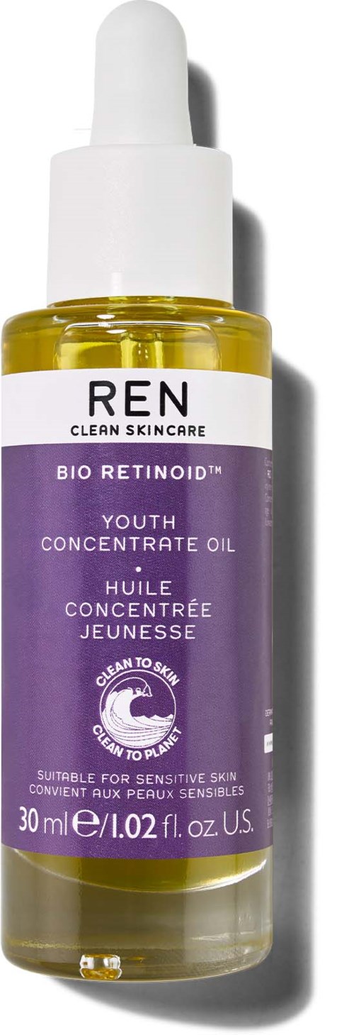 En flaske REN Bio Retinoid Youth Concentrate Oil for sensitiv hud, 30 ml, lilla og hvit etikett.