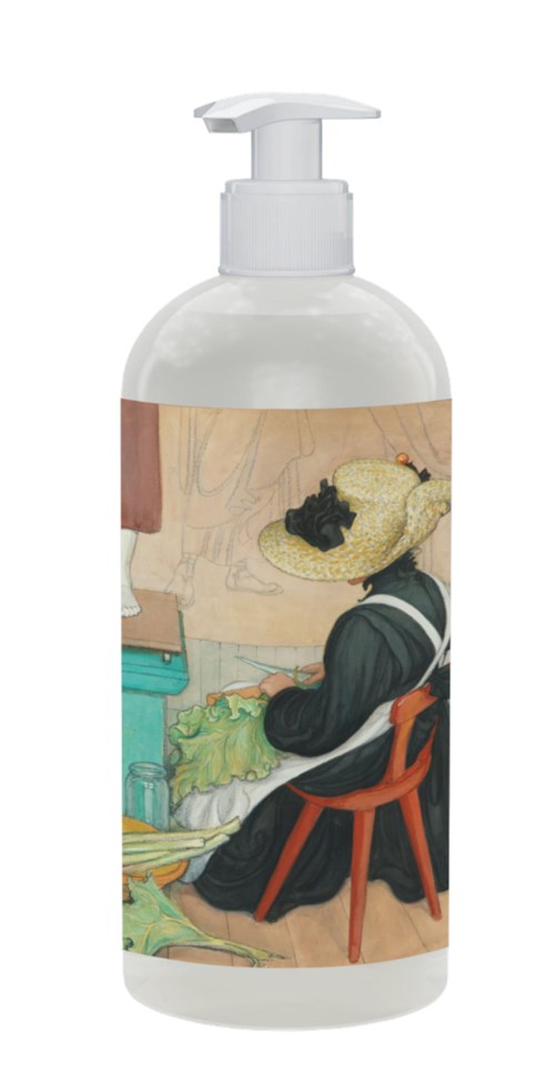 A person in a hat is sitting on a chair, facing a painting or picture and working with brushes and a palette.