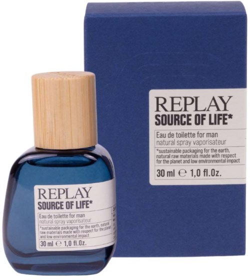 A small blue perfume bottle with a wooden cap and a matching blue box. The label says 'REPLAY SOURCE OF LIFE'.