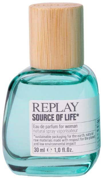 A small perfume bottle with a wooden cap labeled 'REPLAY SOURCE OF LIFE' and 'for woman.'