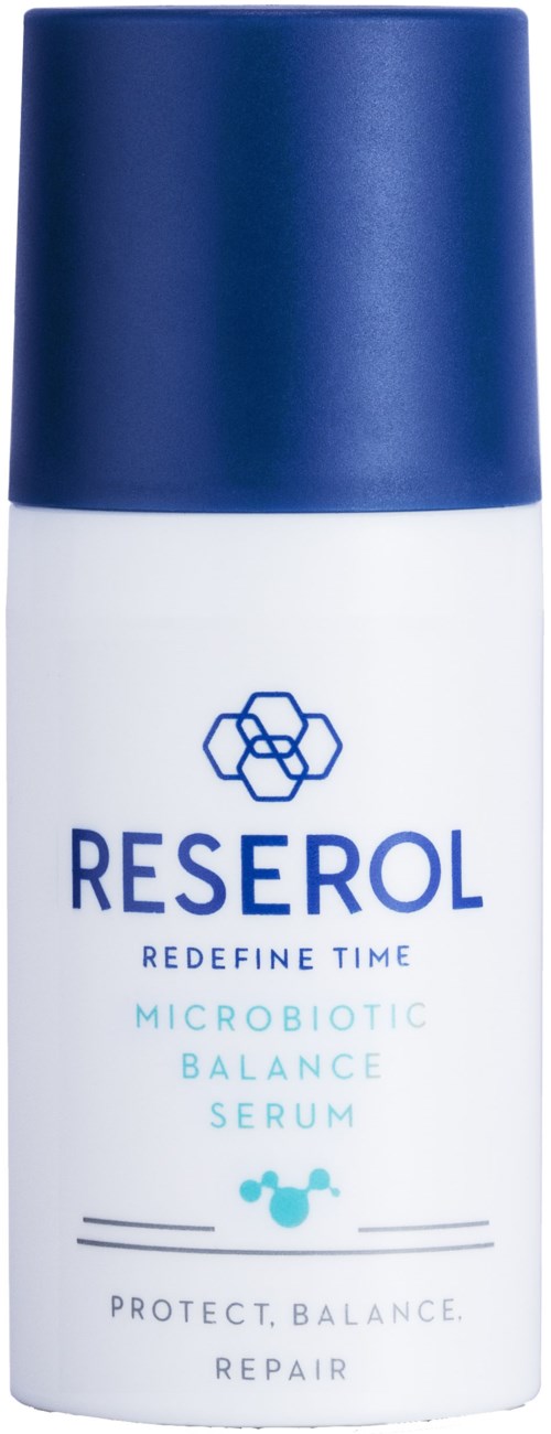 Een wit flesje met een donkerblauwe dop, met label Reserol Microbiotic Balance Serum, gericht op huidgezondheid.