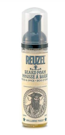 A small bottle of Reuzel Beard Foam with a black pump, branded label, and an illustrated bearded man logo.