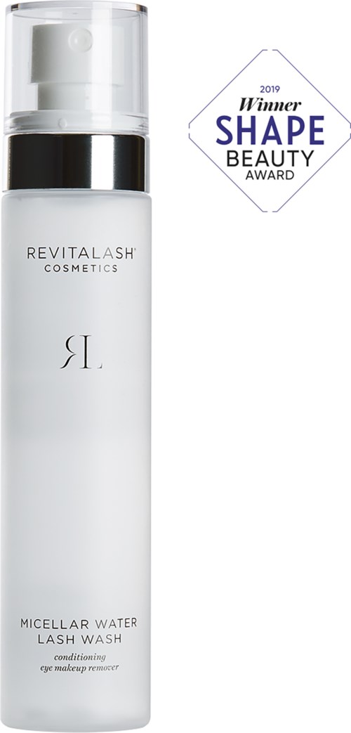 A white bottle with a clear cap and black band, labeled 'Revitalash Cosmetics' and 'Micellar Water Lash Wash.'