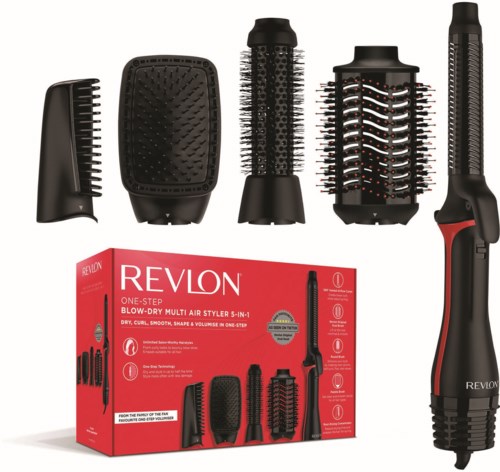 Een set haarstylingtools met verschillende borstel- en kamopzetstukken en een rode Revlon-doos voor een multistyler.